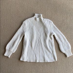 White turtleneck sweater